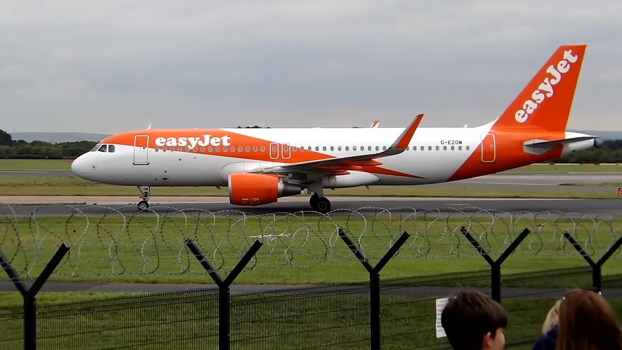 Manchester Airport Spotting! G-EZOM landing and taxiing into Manchester Airport!