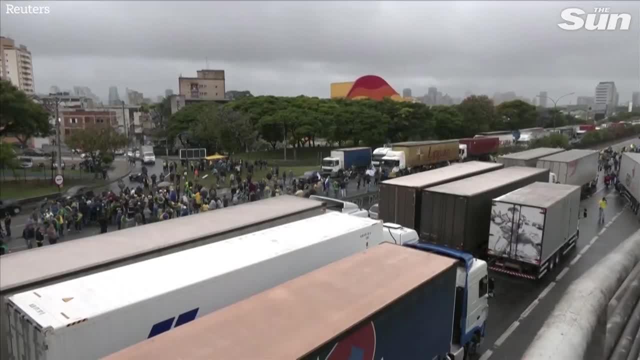 Brazilian police fire water cannons and rubber bullets at anti Lula protesters
