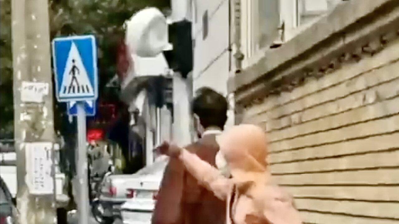 Videos Go Viral of Young Iranian Protestors Smacking Turban Hats Off Islamic Clerics' Heads