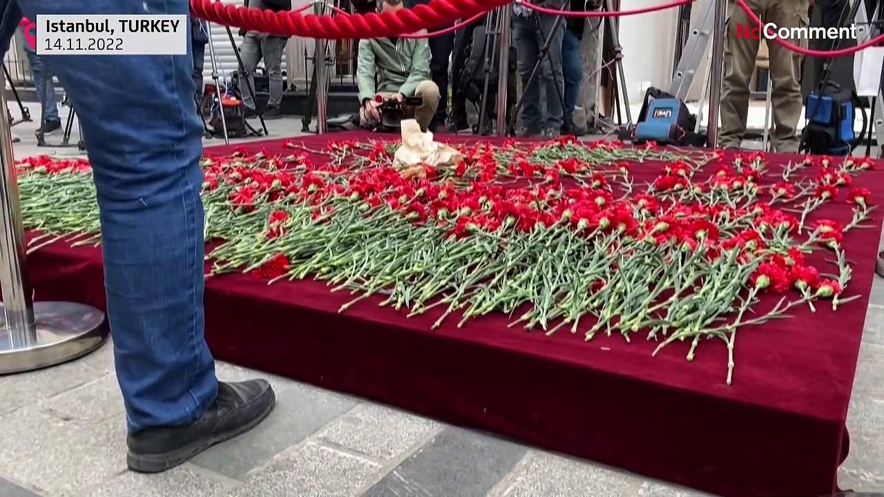 Mourners lay flowers to the victims of deadly Istanbul bombing