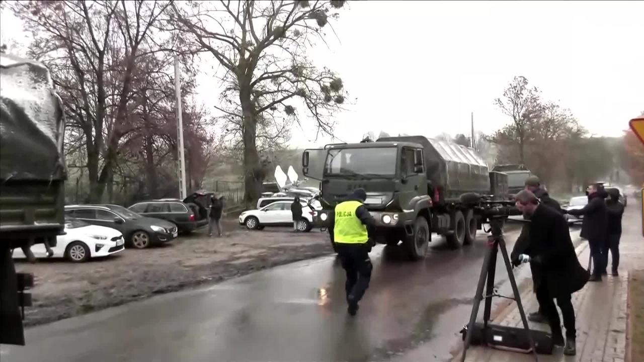 Polish army attends missile strike blast site
