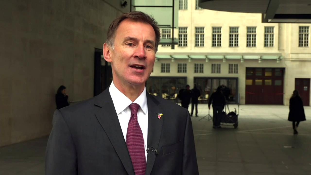 Hunt says budget is ‘plan that helps us get through to other side'