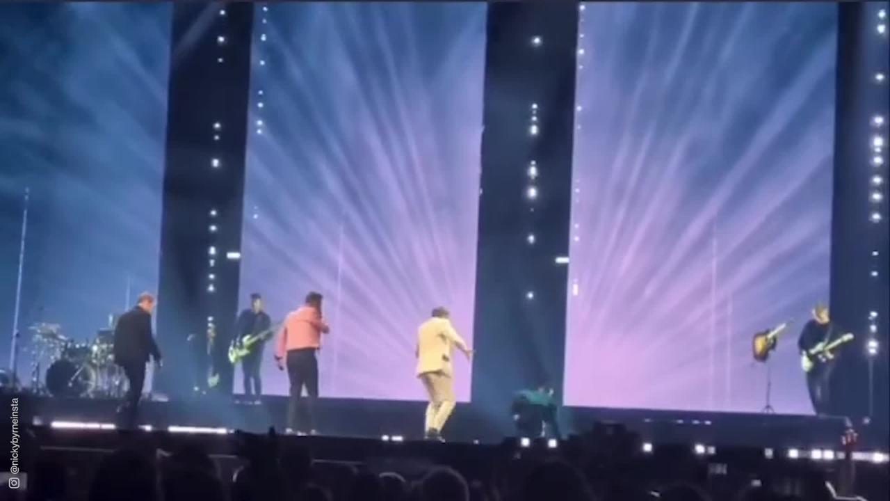 Westlife's Nicky Byrne falls off the stage at Glasgow