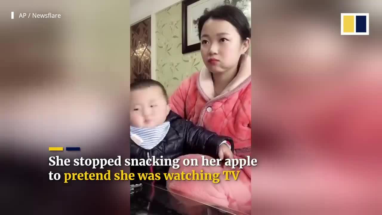Chinese mum’s acting keeps food-loving baby from swiping her snack