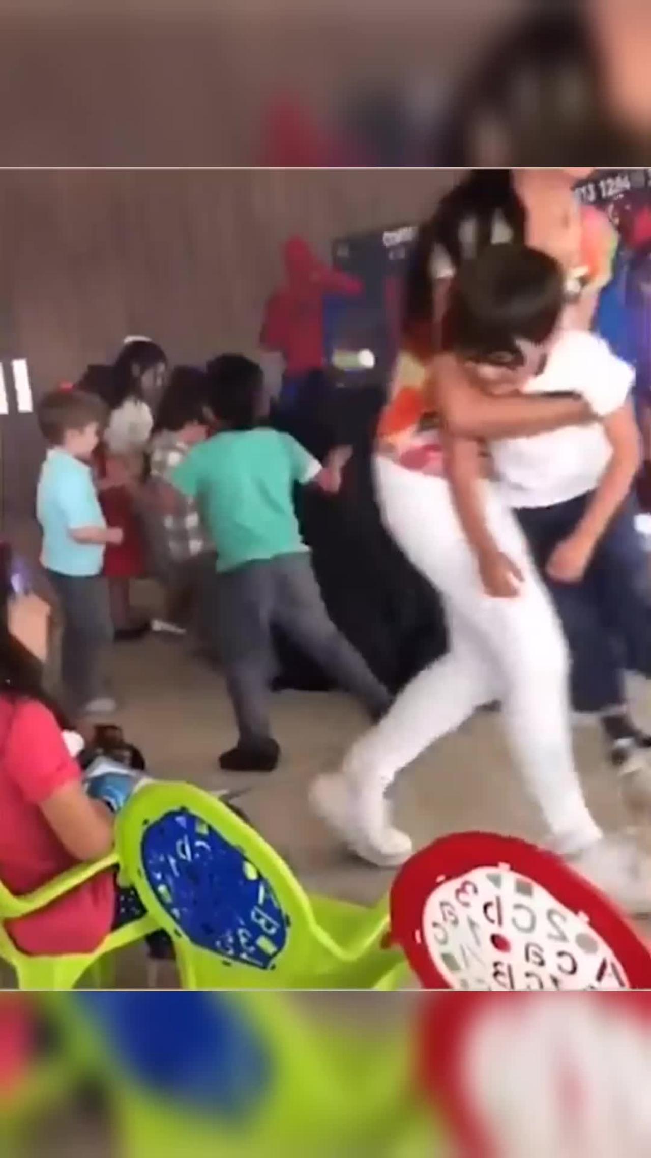 Kid jumps into a Fight to save his Favourite Super Hero. Too funny