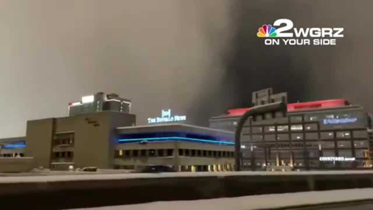 Snow wall moves over downtown Buffalo on Friday night
