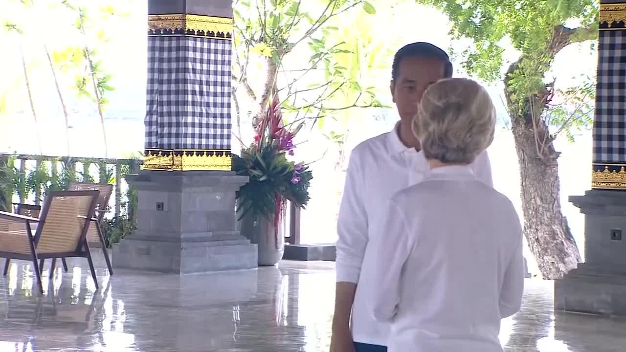 US President Joe Biden wearing dark Aviator Sunglasses joins global leaders at Hutan Mangrove Forest