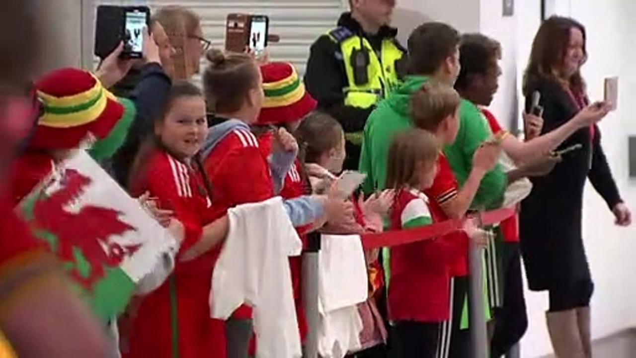 Wales’ footballers warmly welcomed home by fans
