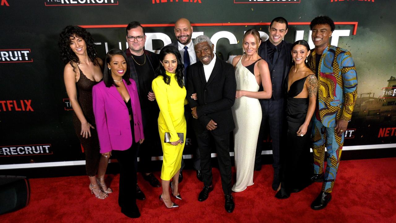 Cast of Netflix's 'The Recruit' pose together at their world premiere in Los Angeles