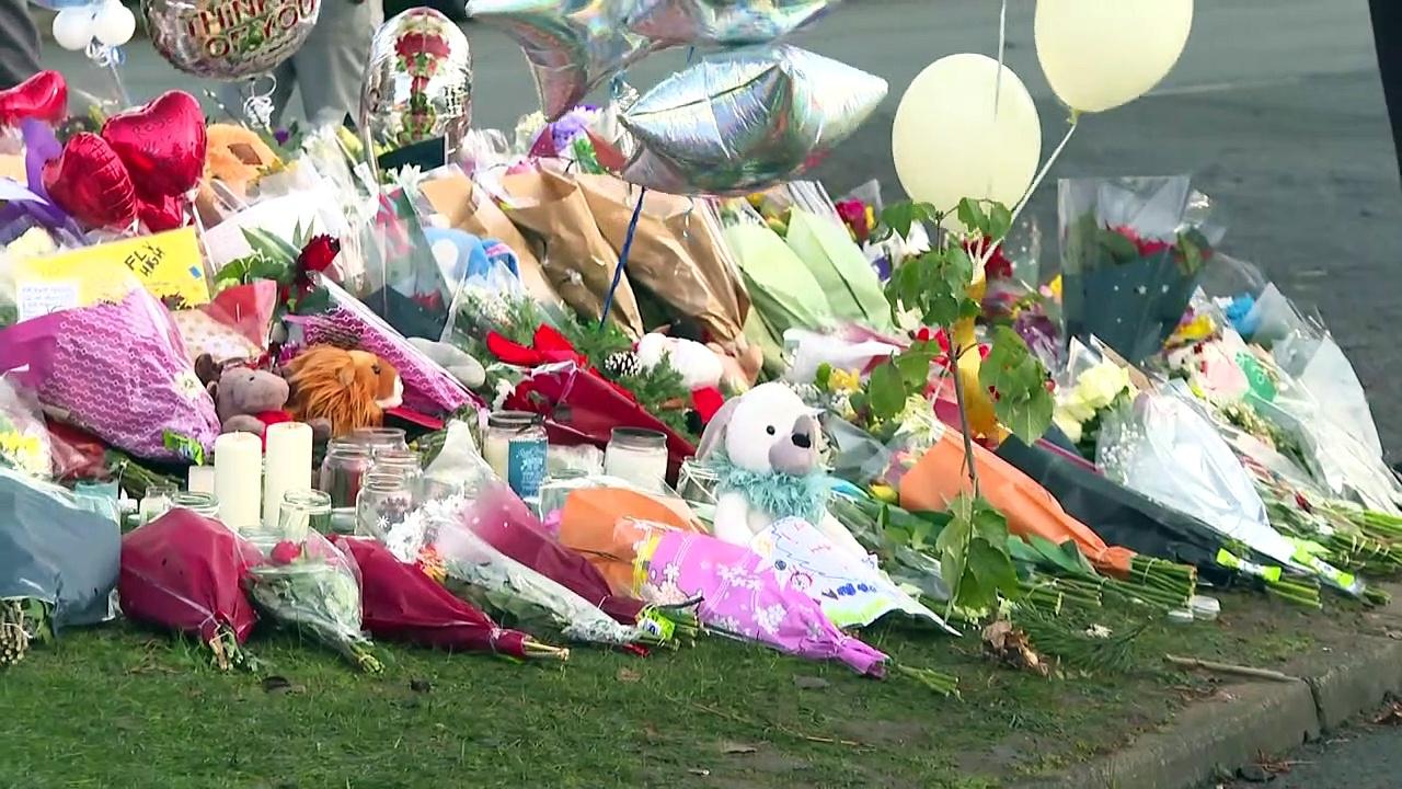 Toys, balloons and bouquets left at Solihull lake tribute