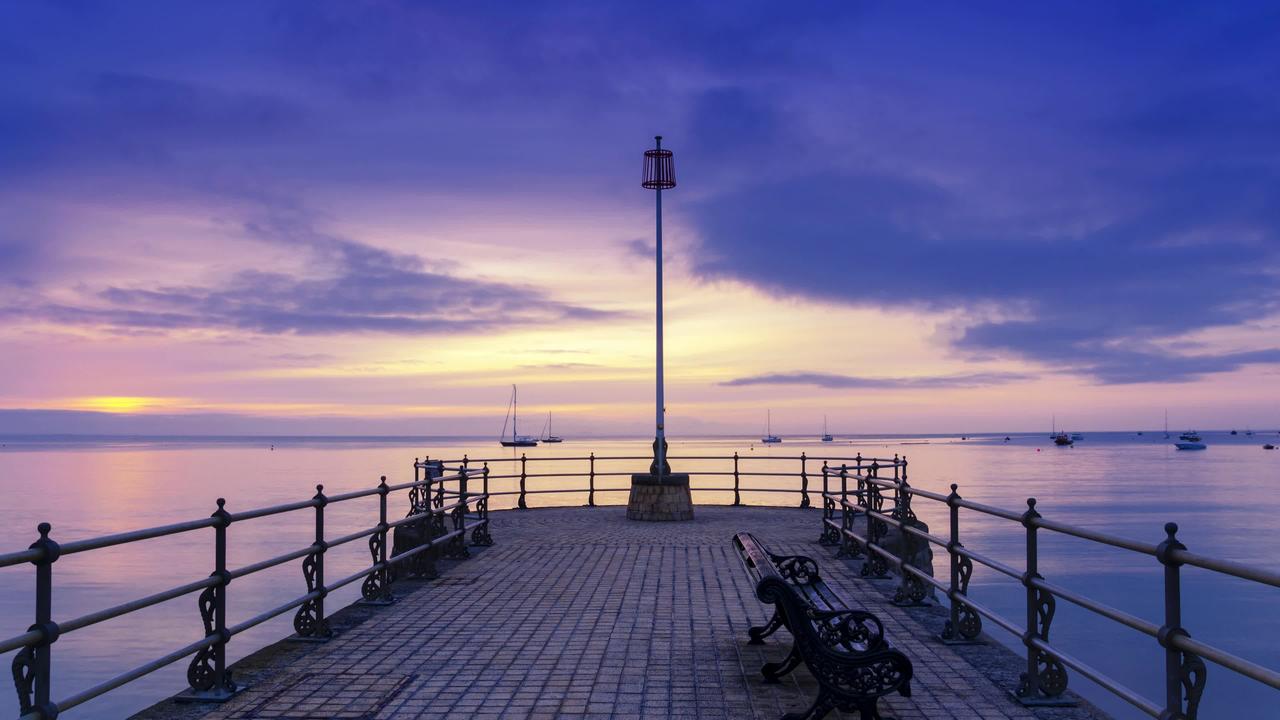 Sunset Over Beautiful Pier With Sky Background Loop (No Copyright)