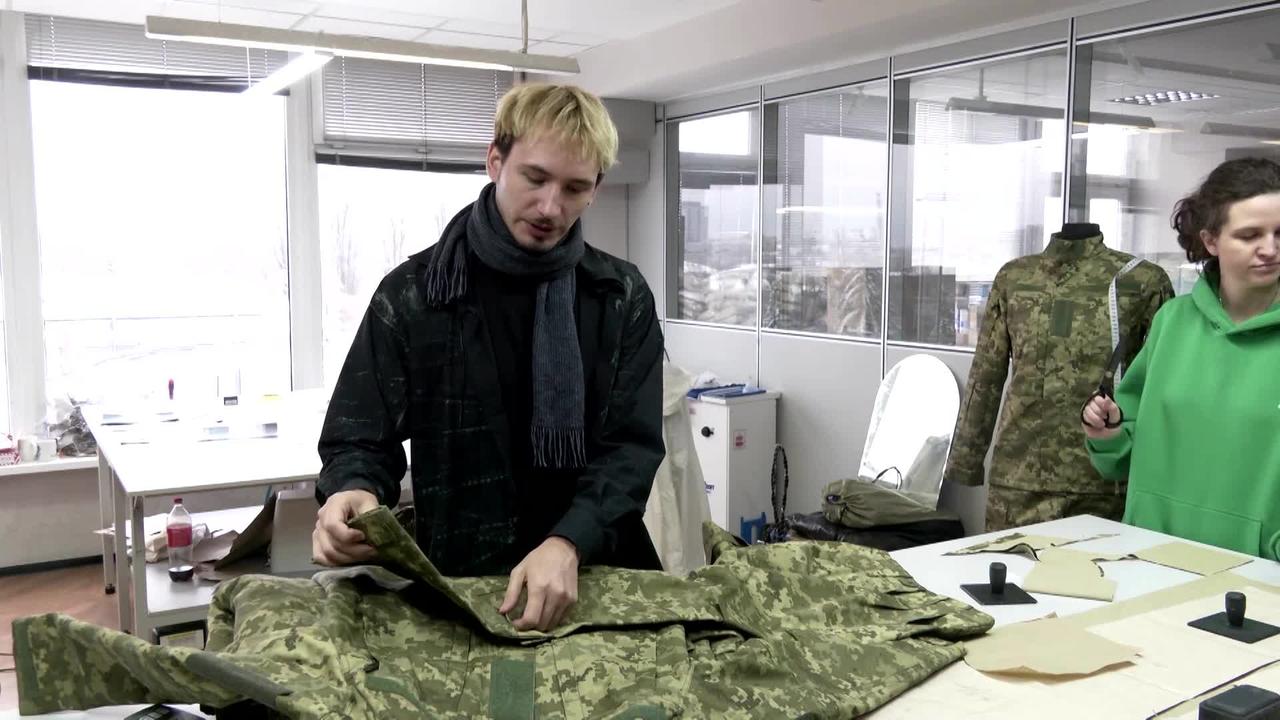 Volunteers make army uniforms for Ukrainian - One News Page VIDEO