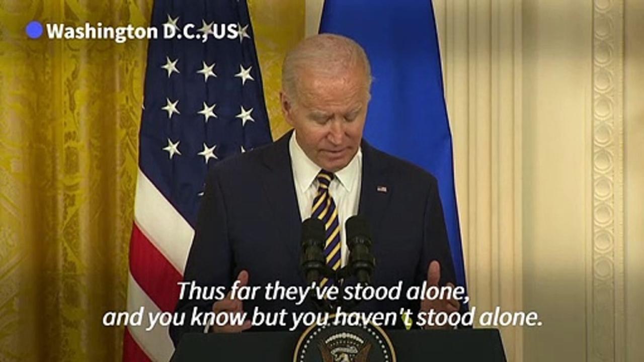'You'll never stand alone,' Biden tells Zelensky