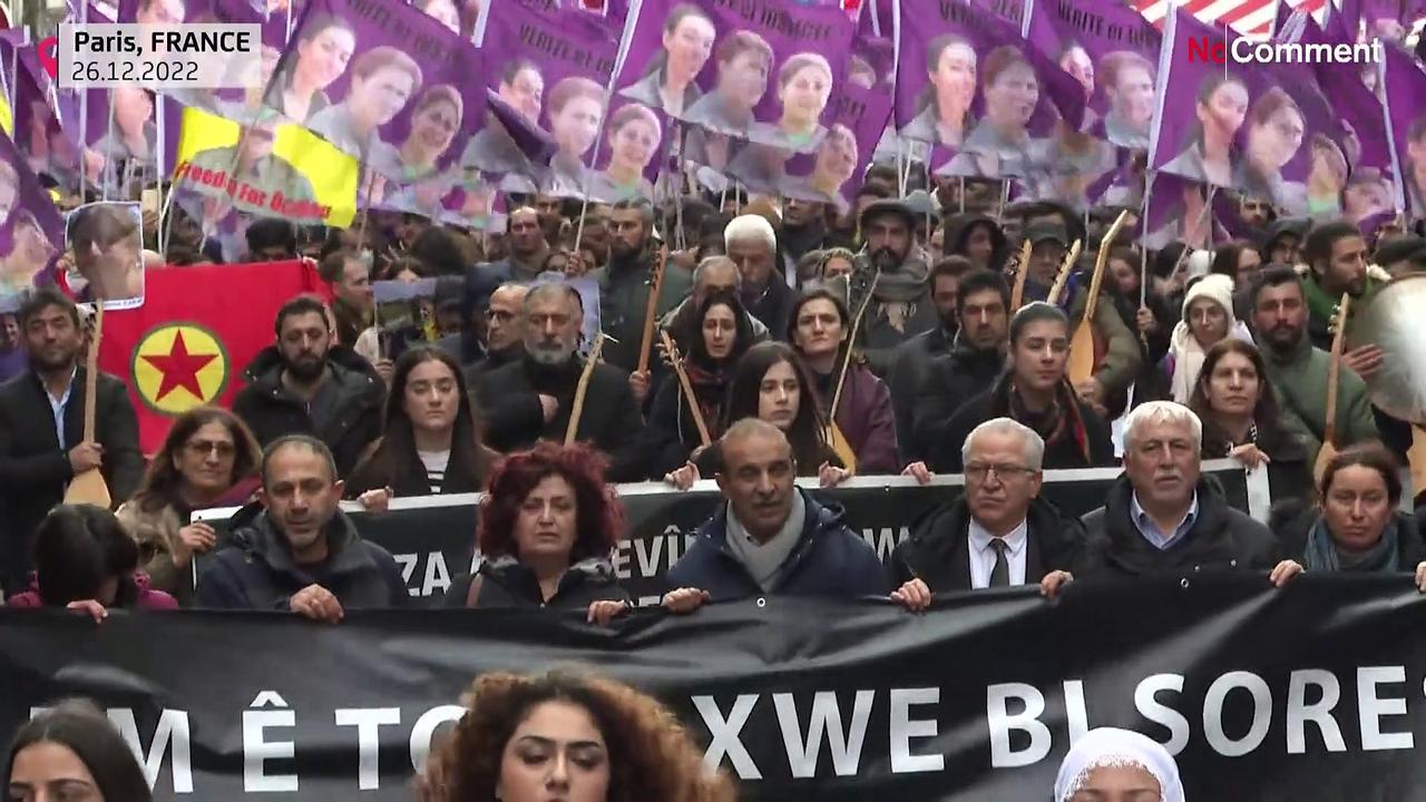 Watch: Hundreds march in Paris in tribute to Kurds shot dead