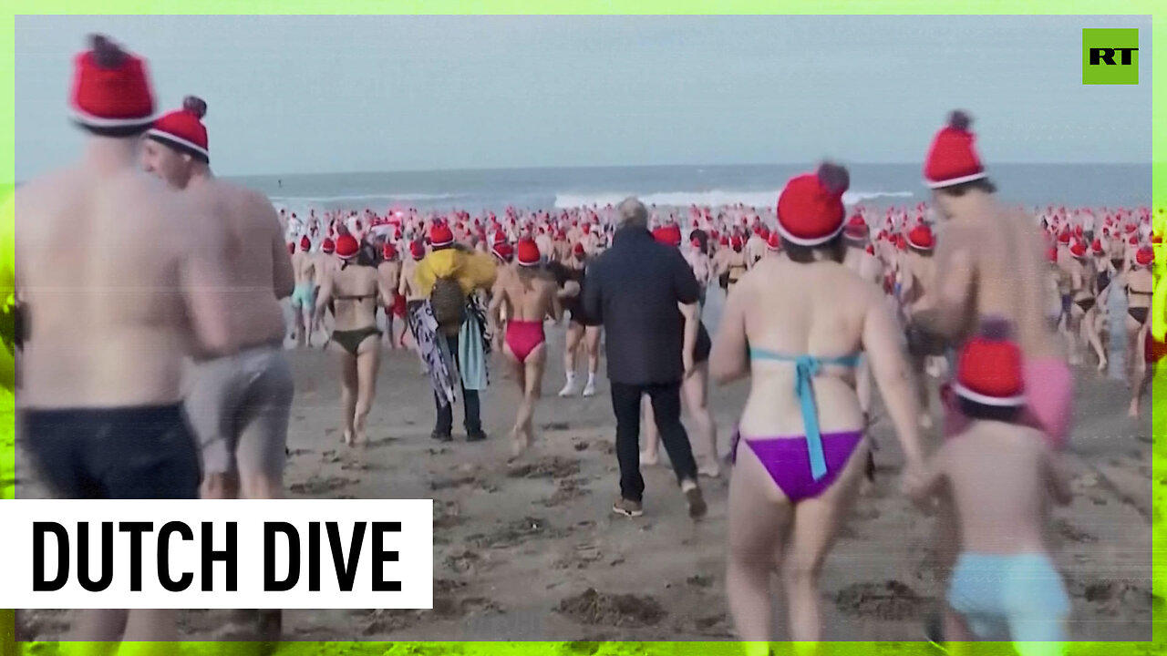 Swimmers plunge into icy waters on New Year’s Day in the Netherlands