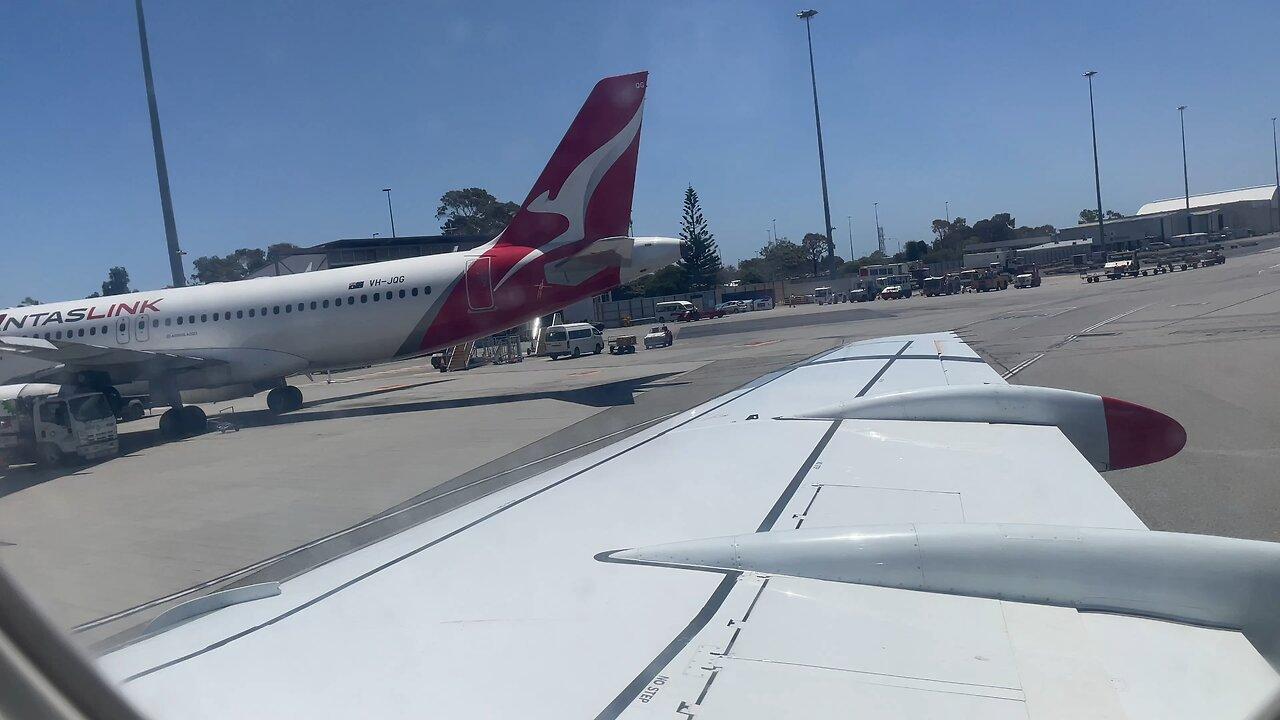 Qantas Fokker 100 pushback Perth Airport YPPH