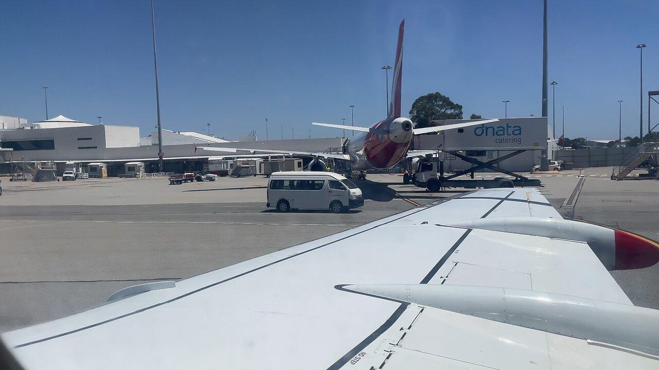 Qantas Fokker 100 taxi Perth Airport YPPH
