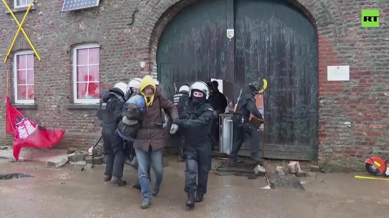 Police drag climate activists out of German village over coal mine expansion