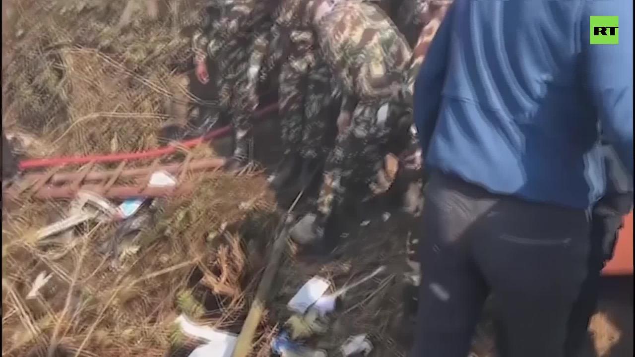 Rescuers search wreckage of crashed Nepal plane