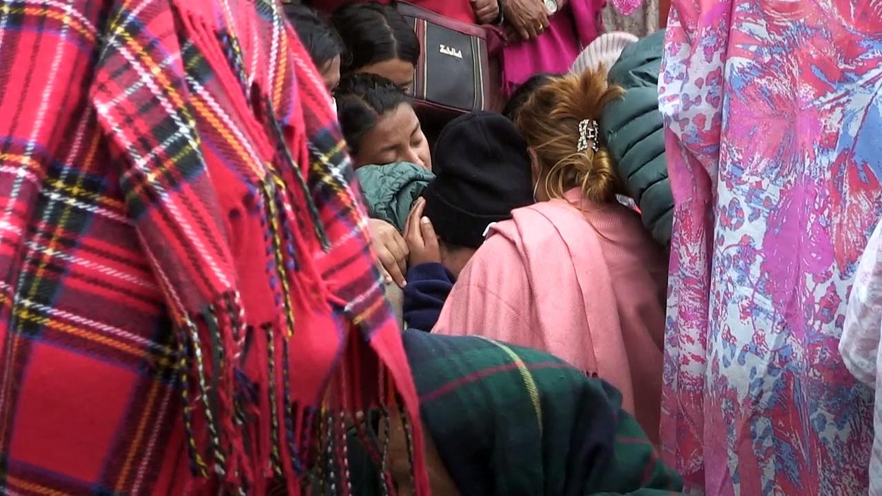Families of Nepal plane crash victims wait for the release of bodies outside Pokhara hospital
