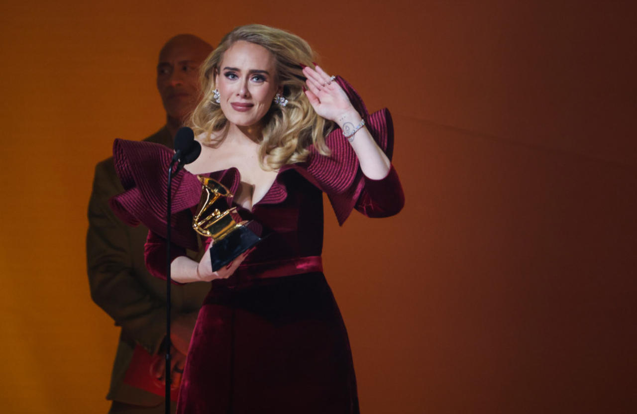 Adele dedicates Grammy win to son Angelo in tearful tribute