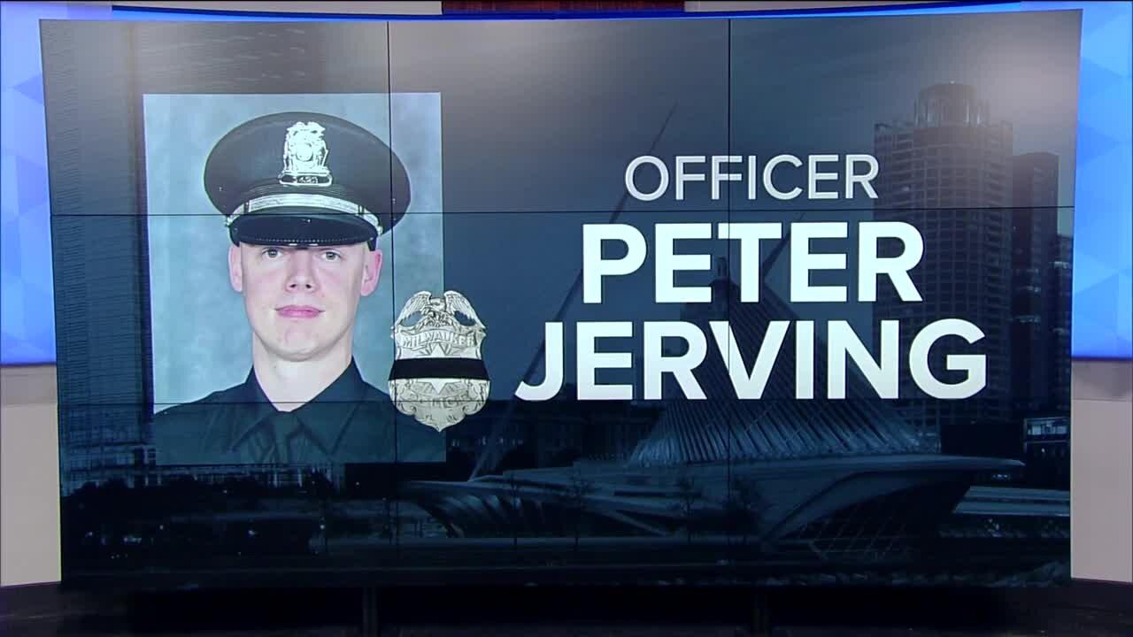 Police officer fatally shot while trying to arrest armed robbery suspect