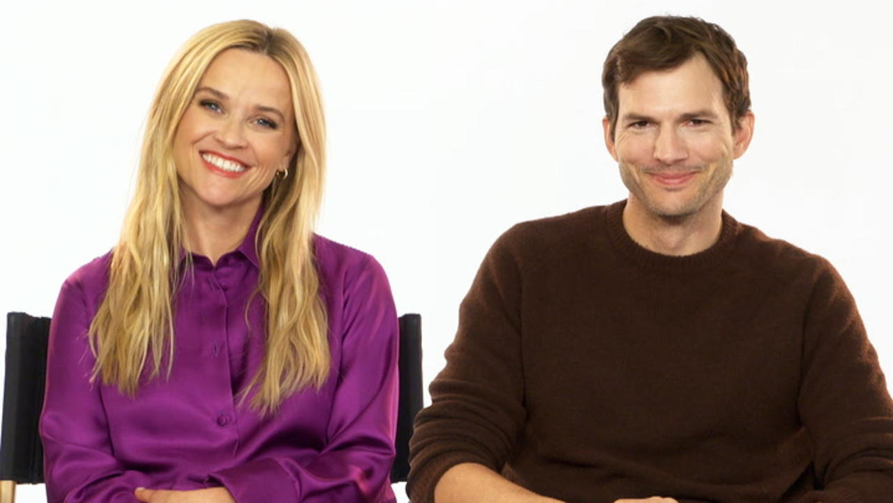 Reese Witherspoon Recounts Ashton Kutcher Holding a 'Cooler Full of Red Bulls' First Time They Met