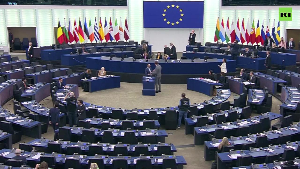 Kurdish protesters interrupt EU Parliament session