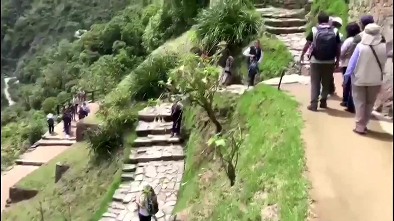 Peru's Machu Picchu reopens to tourists after a month
