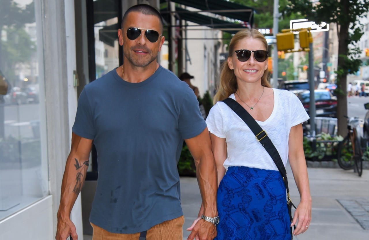 Mark Consuelos is delighted he's found a way to 'get paid' to listen to his wife Kelly Ripa