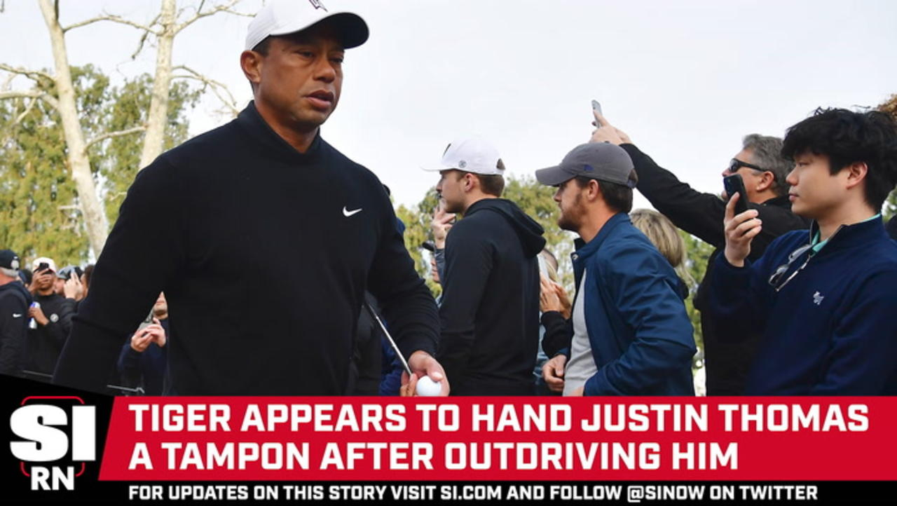 Tiger Woods Appears to Hand Justin Thomas a Tampon After Outdriving Him