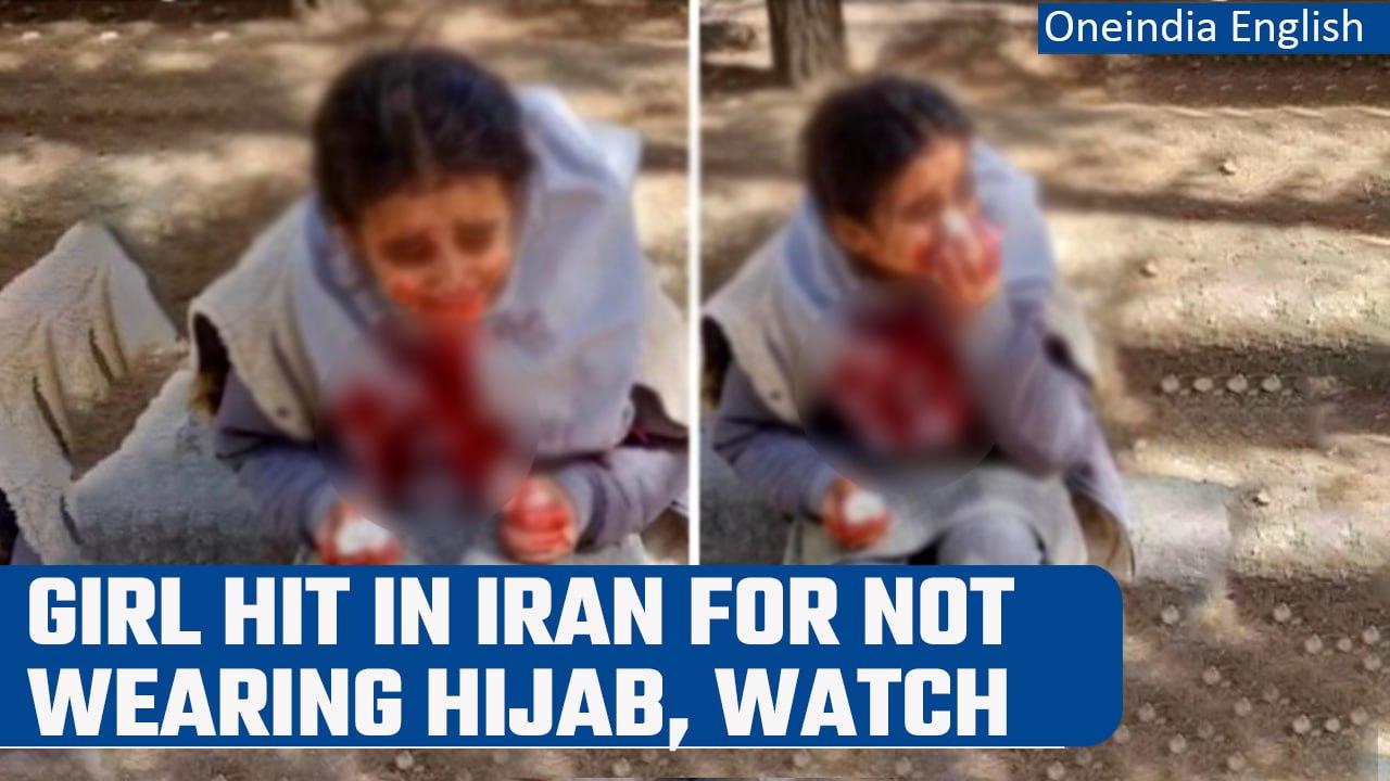 Iran: Video shows little girl hit in the face for not wearing hijab | Watch | Oneindia News