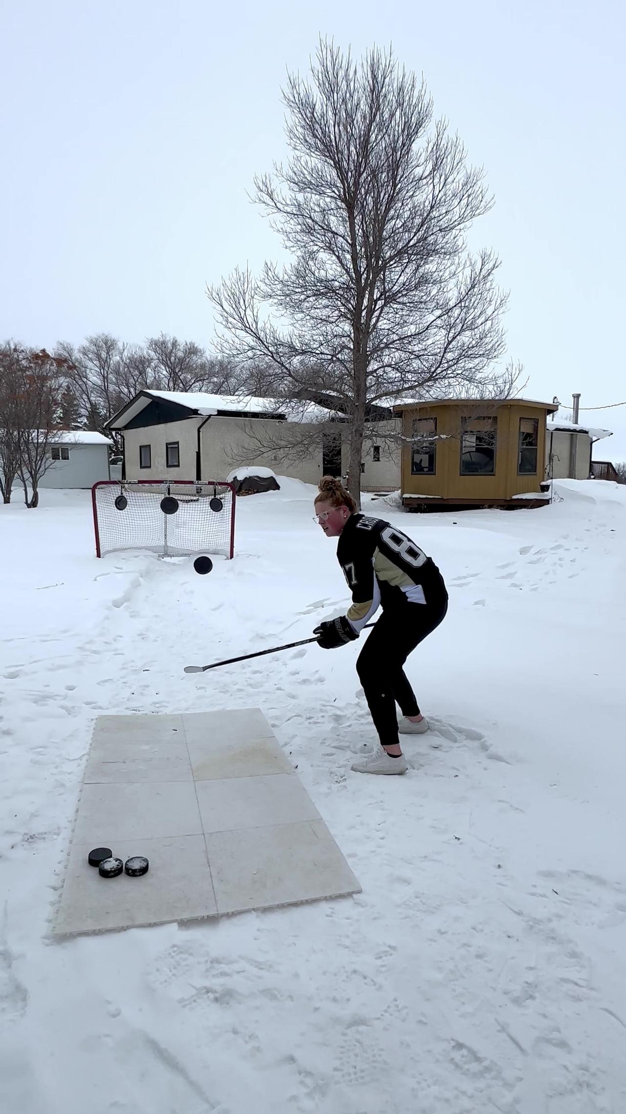 Female Hockey Player Does Awesome Trick Shots