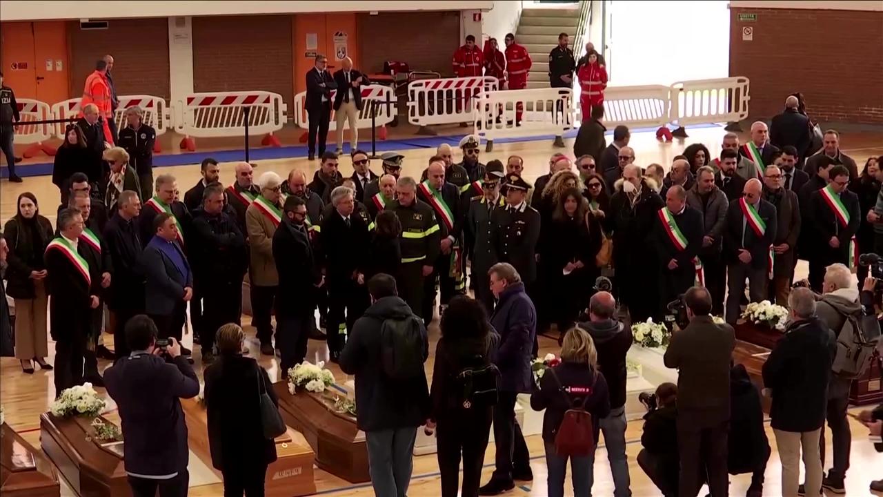 Italy shipwreck survivors bid farewell to victims' coffins