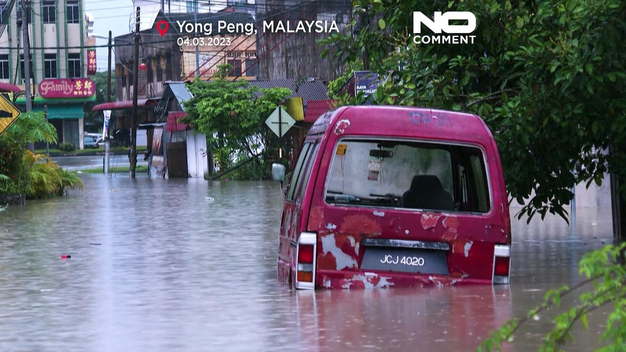 Watch: Malaysian towns flooded because of ‘unusual’ torrential rains