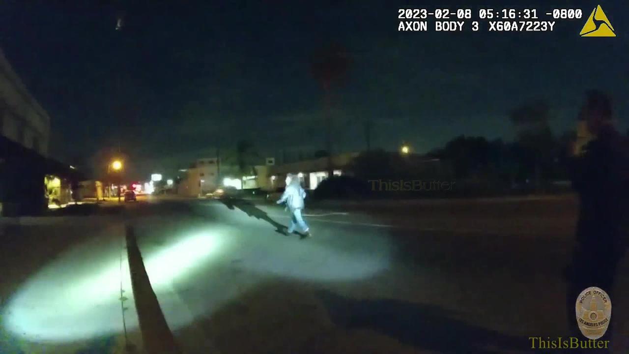 Body cam shows a LAPD officer using their vehicle to knock down a man armed with a knife