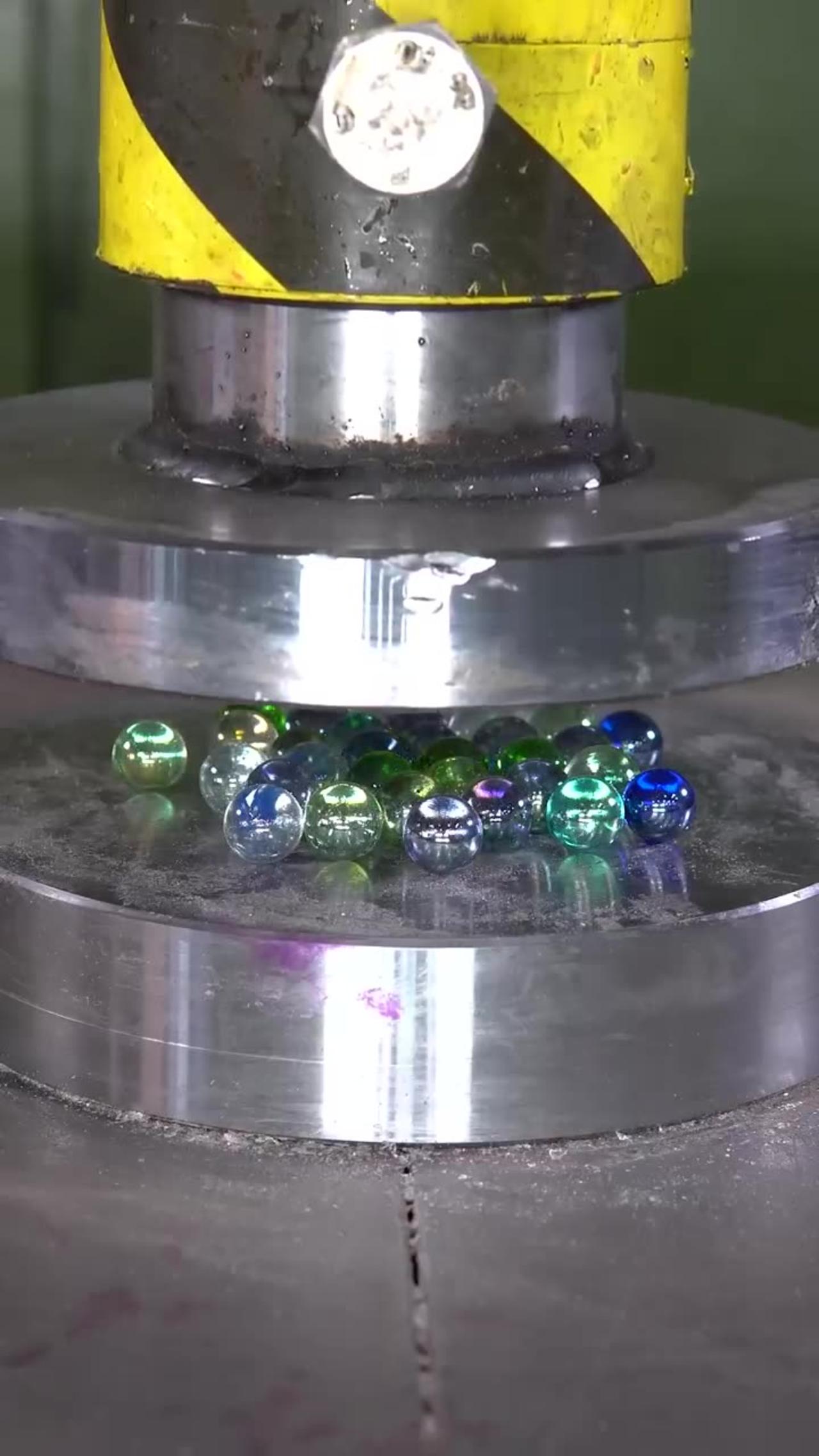 Hydraulic Press / crushing marble balls with 150 One News Page VIDEO