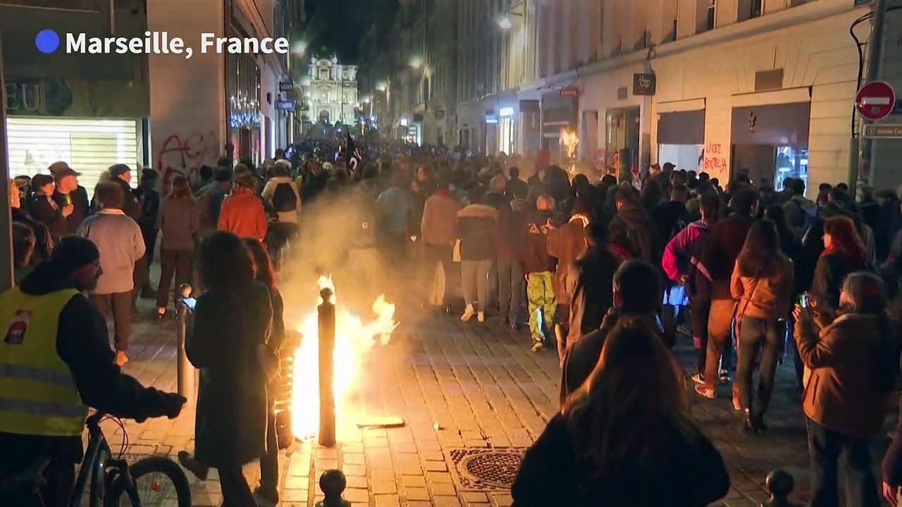 Protests across France after Macron forces through pension reforms