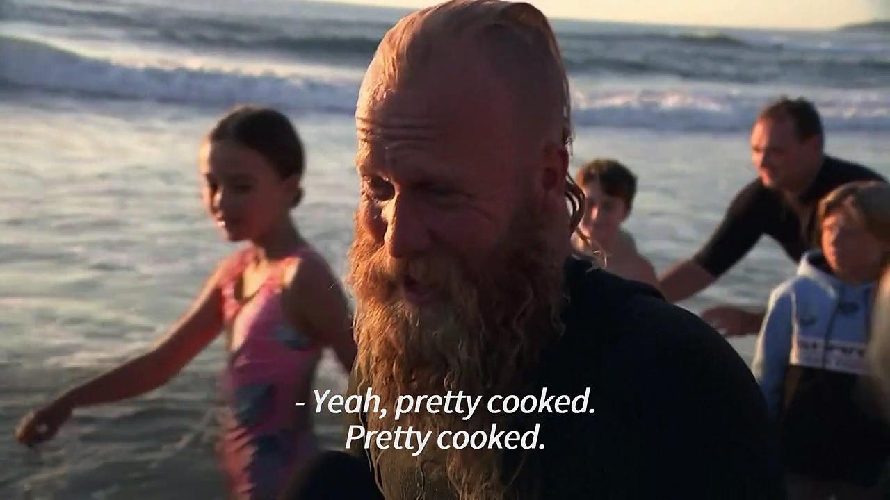 Australian surfs for 40 hours to smash world record