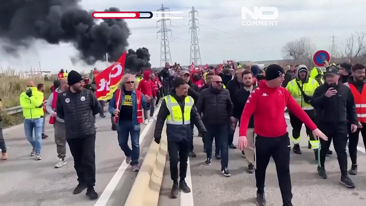 Watch: French strikers clash with riot police deployed outside oil depot