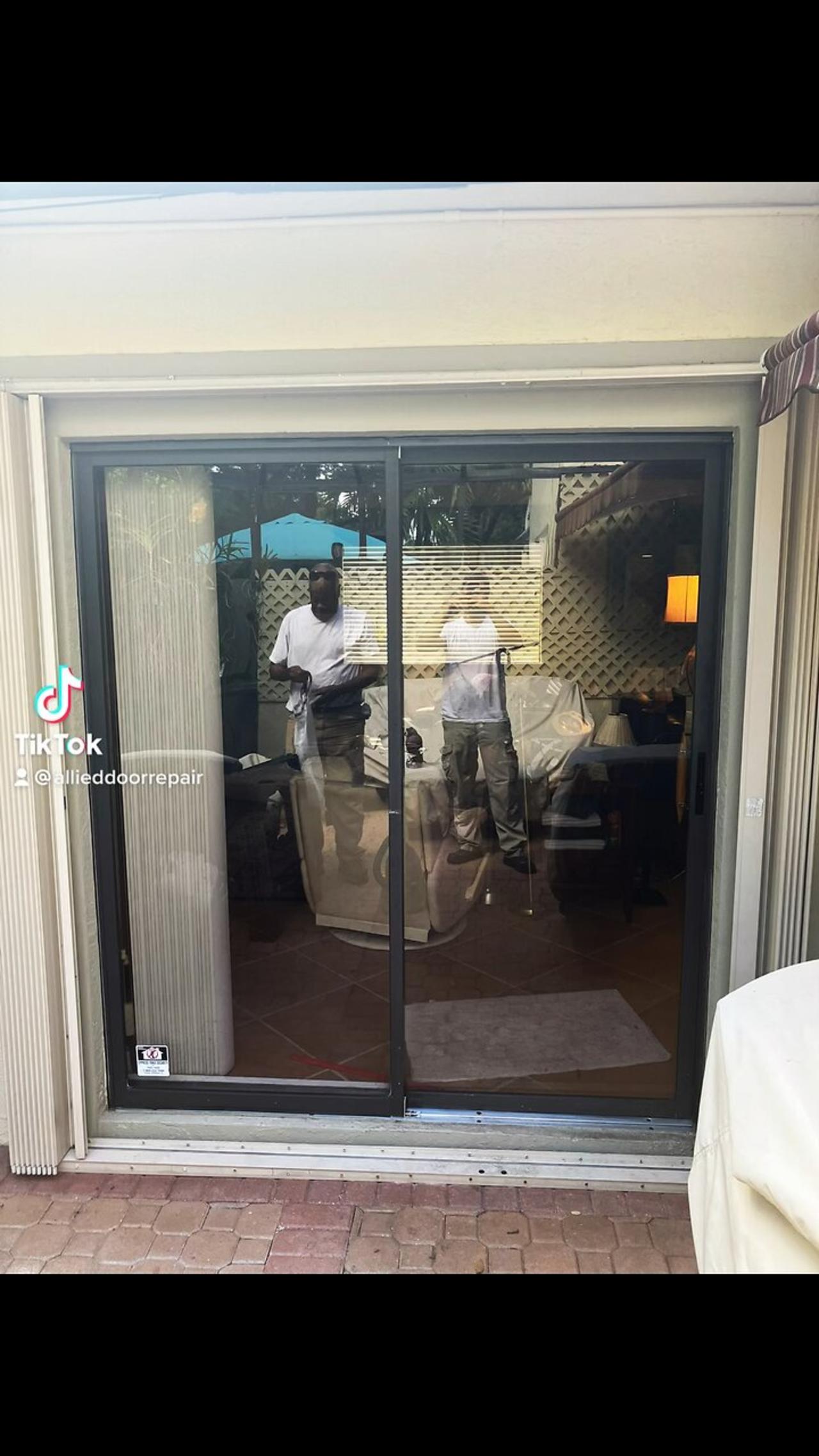 Sliding glass door repair; roller replacement and track refurbishing, in Coral Springs, Fl.