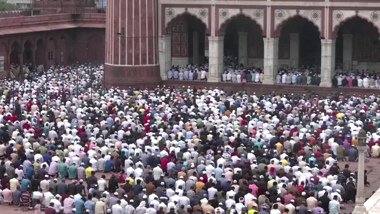 Muslims attend first Friday Ramadan prayers