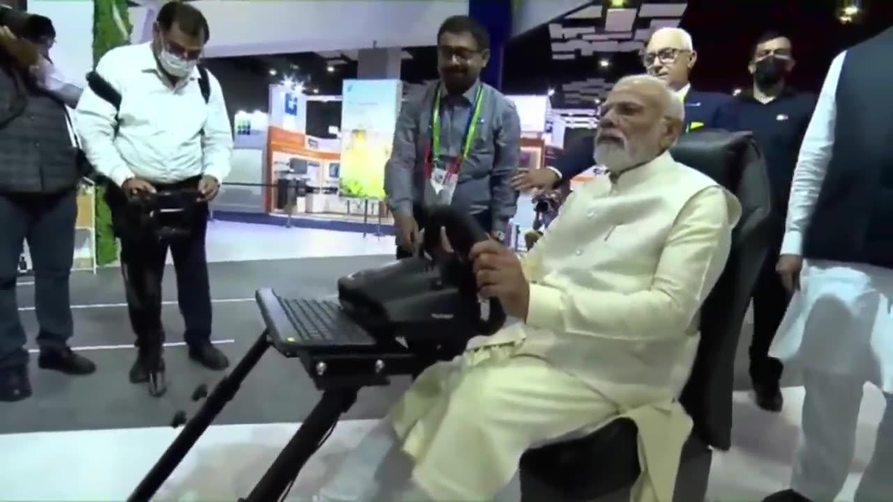PM Modi driving a car in Europe while seated in India through 5G network. Check out the video.
