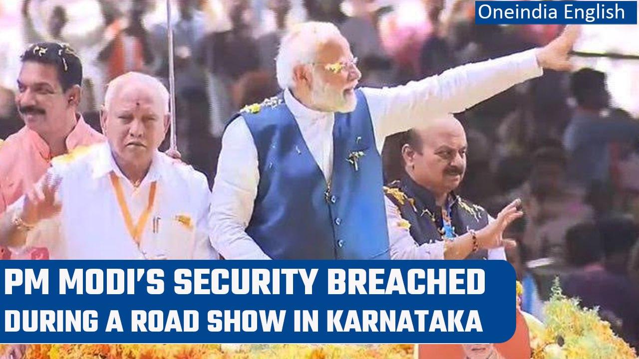 PM Modi’s security breached during a road show in Karnataka, Watch Video | Oneindia News