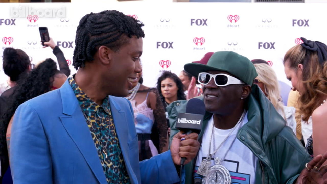Flava Flav on His Connection to Taylor Swift & Love For Lenny Kravitz | iHeart Radio Music Awards 2023