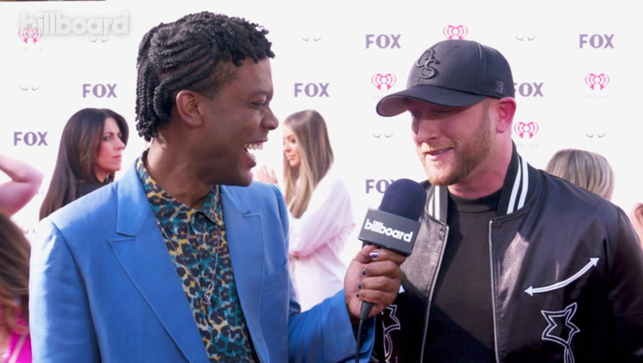 Cole Swindell Talks Creating A 'Fun Breakup Song' in 'Drinkaby', Releasing a Deluxe Version of His Album 'Stereotype' & More | i