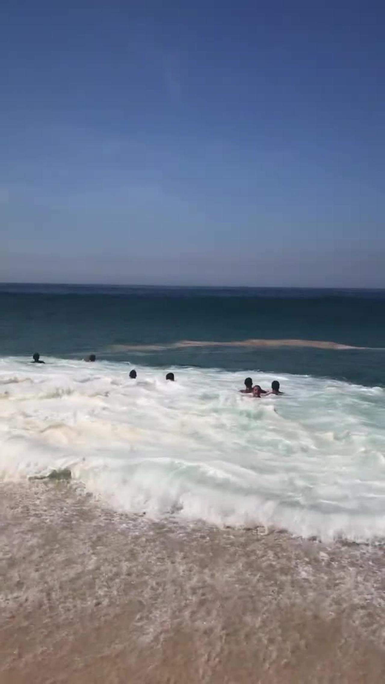 Large Waves Wash Over Beachgoers in Brazil One News Page VIDEO