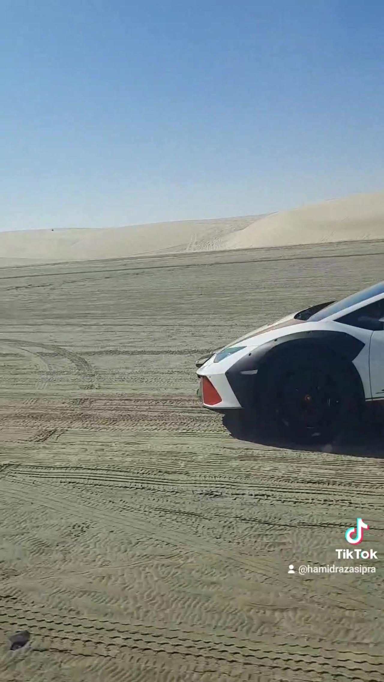 Sports car in the sand