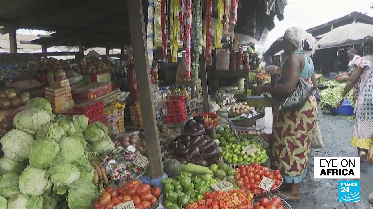 In DR Congo, locals feel the crunch as currency falls and prices rise