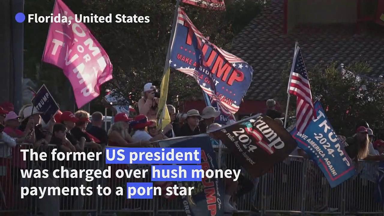 Rival protesters rally for the ex-US president's arraignment